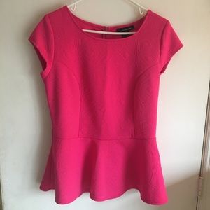 Bright pink peplum top